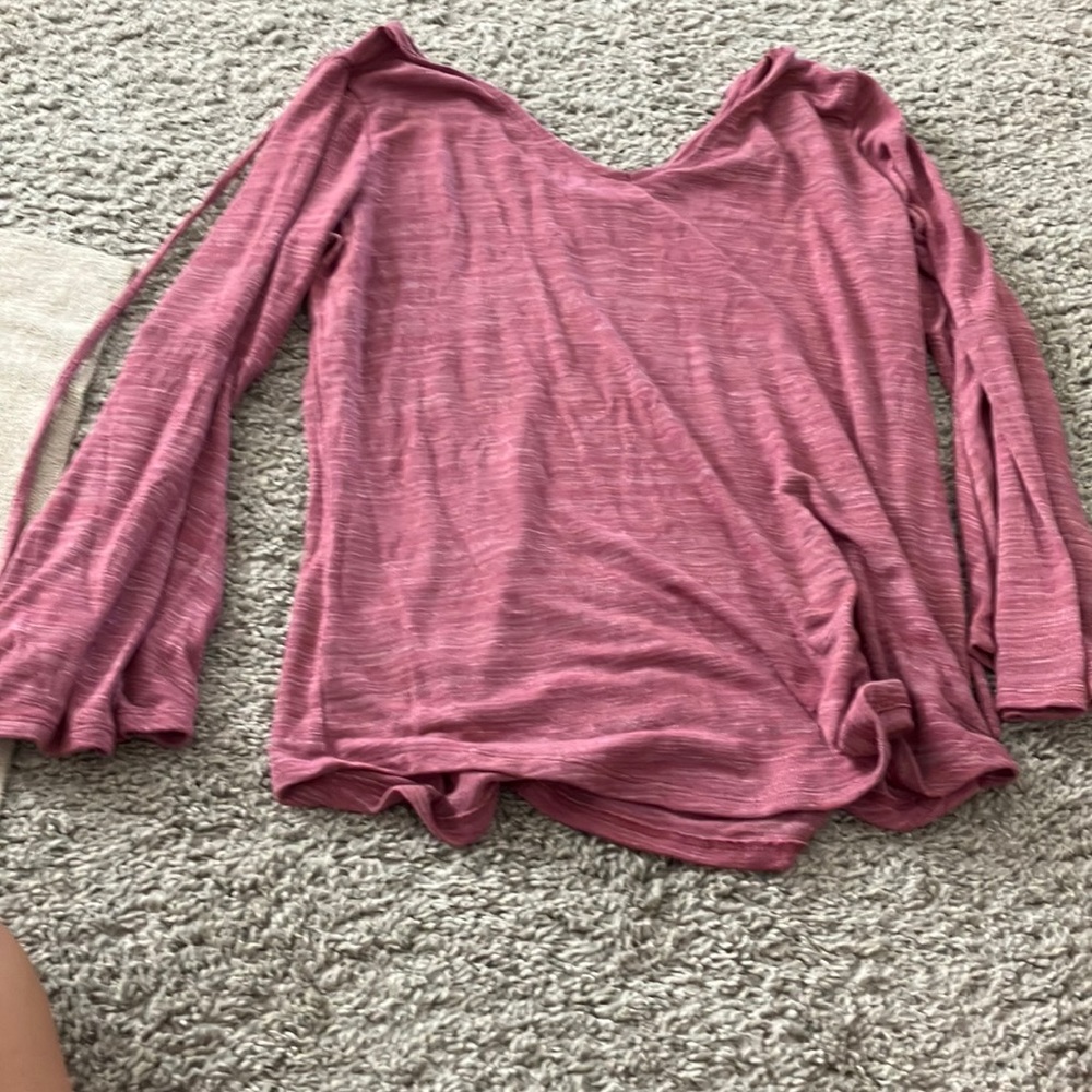 New long sleeve that is a light burgundy.